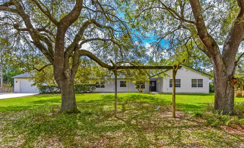 mature trees with front swing
