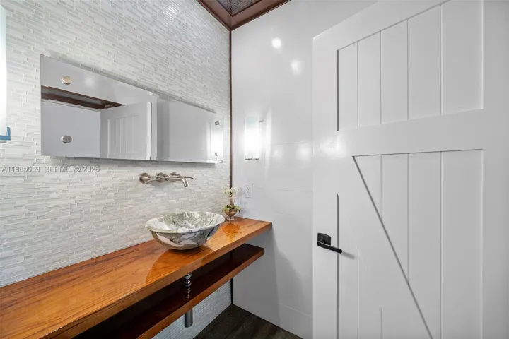 Guest 1/2 bathroom w/custom teak vanity