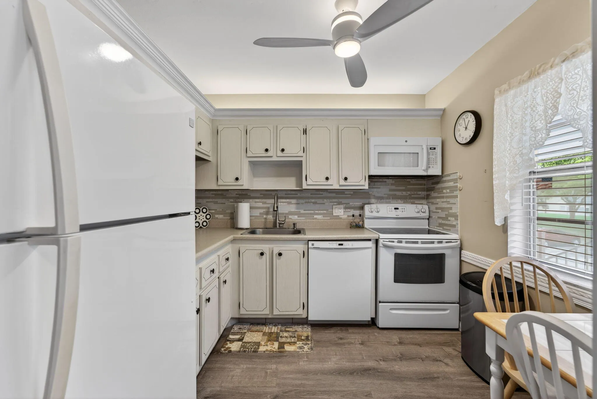 New Floor, Ceiling with Recessed Lights, New Ceiling Fan, Glass tile backsplash