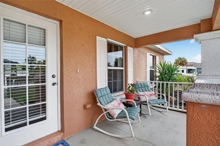Covered front porch w/recessed lighting