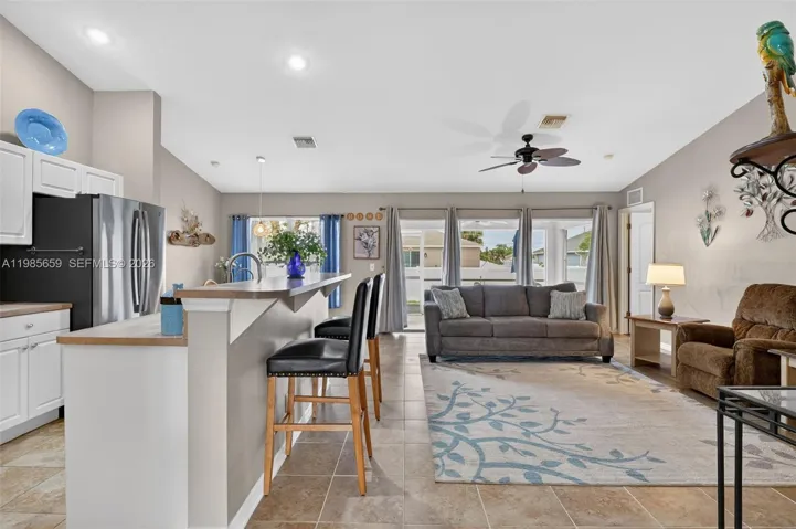 Open layout w/vaulted ceilings and tile flooring