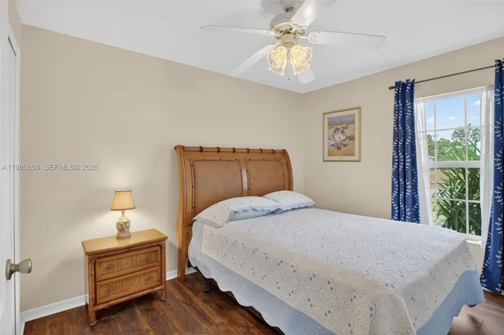 3rd guest bedroom w/closet, tall window, waterproof wood-look floors