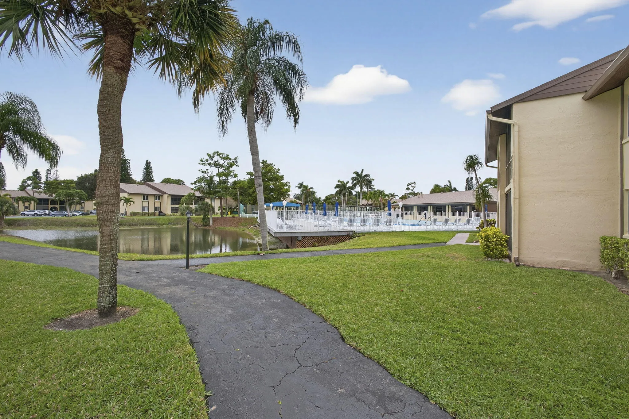 Pool area access just across the street along with a walkway around the lake