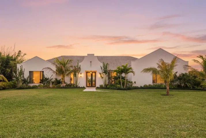 Welcome to 9120 Mockingbird Trail in tranquil Jupiter Farms