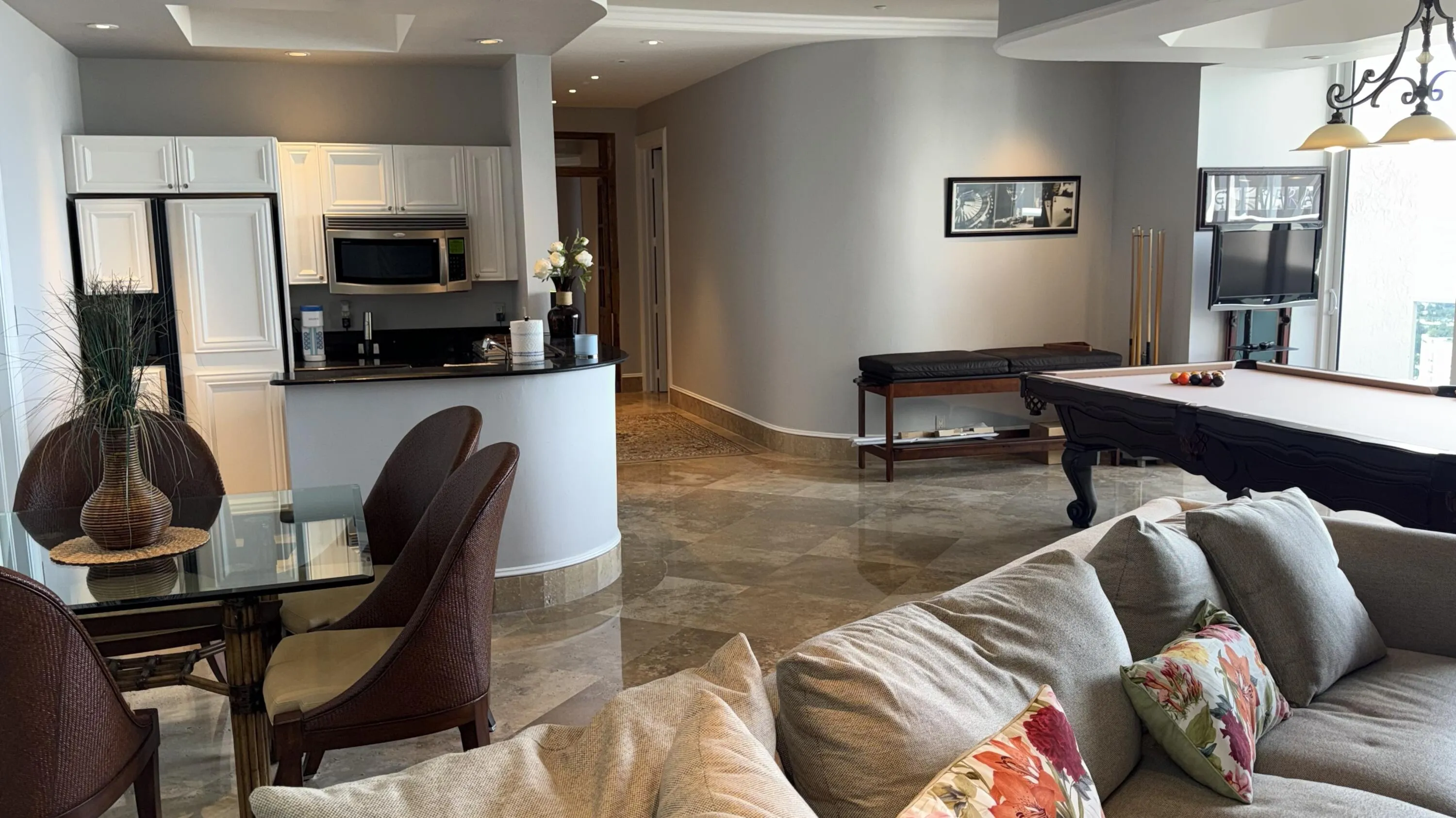 Game room with second kitchen.
