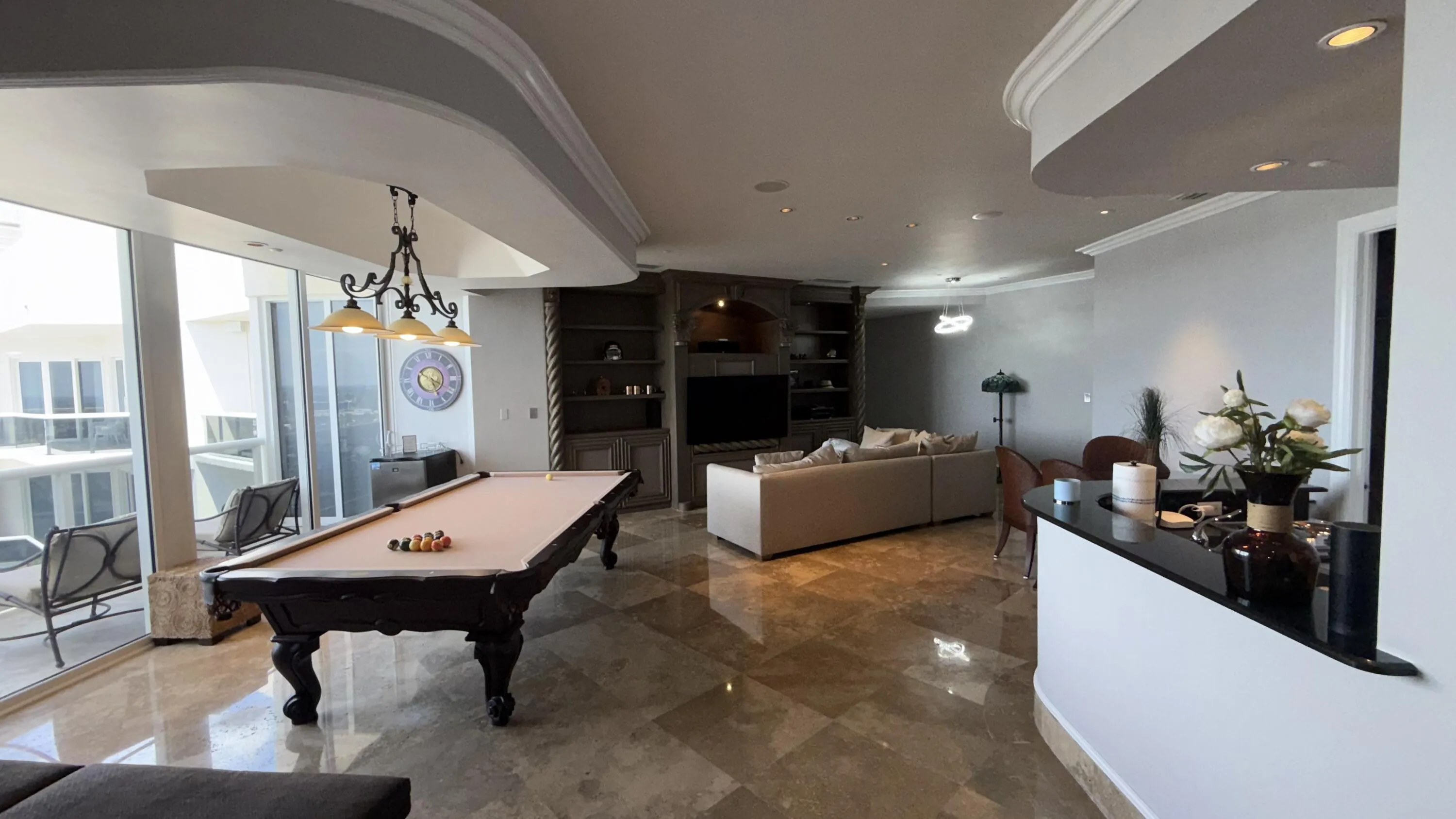 Game Room with entertainment center and second kitchen.