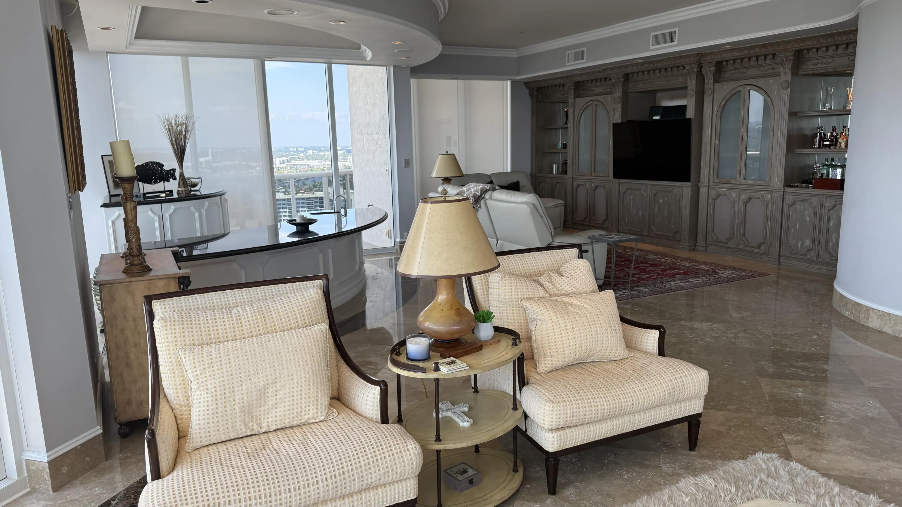 Living room far end with Bar.