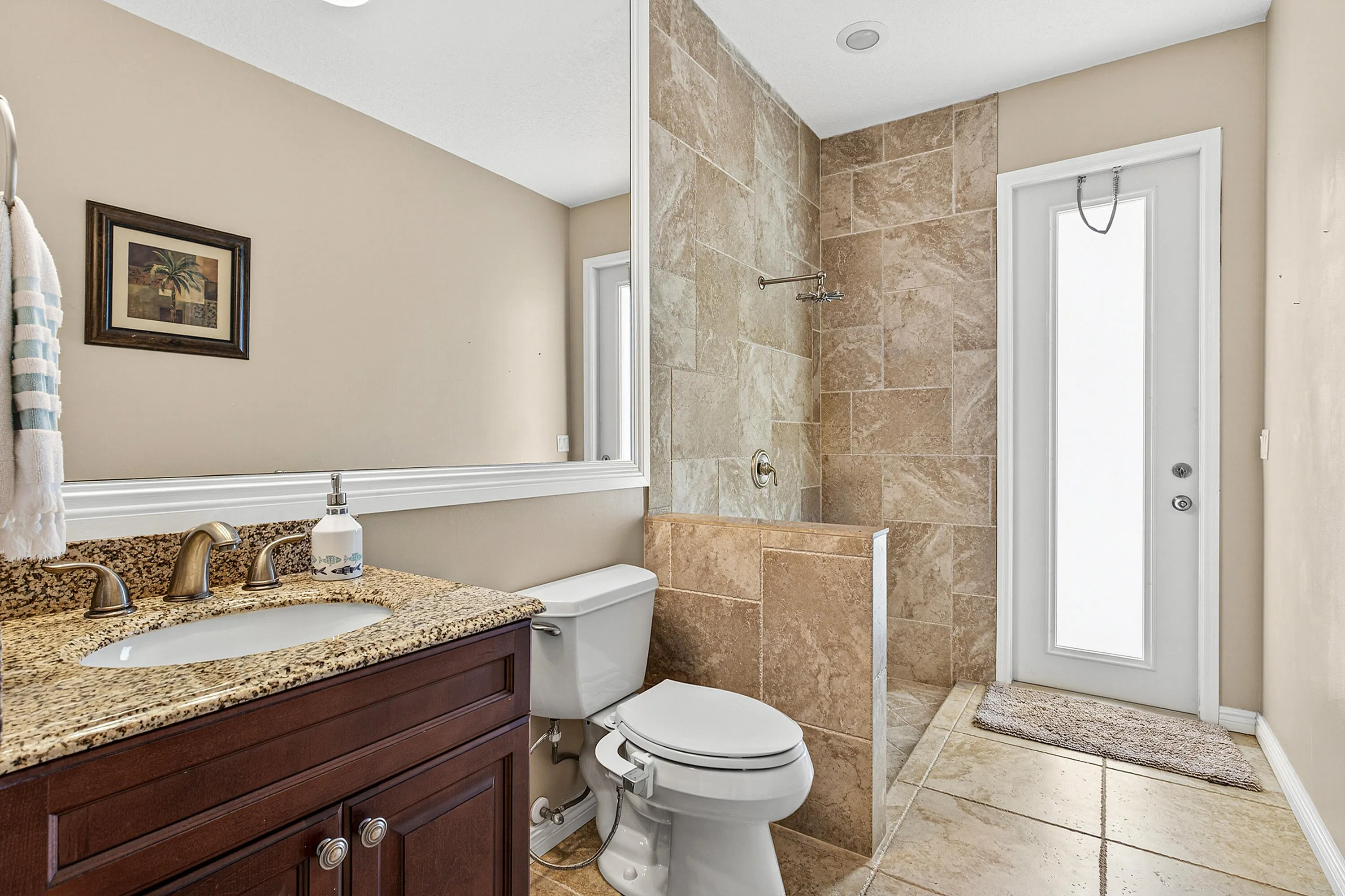 Well-maintained guest bathroom conveniently located near the secondary bedrooms. Clean and functional bathroom serving family members and guests.