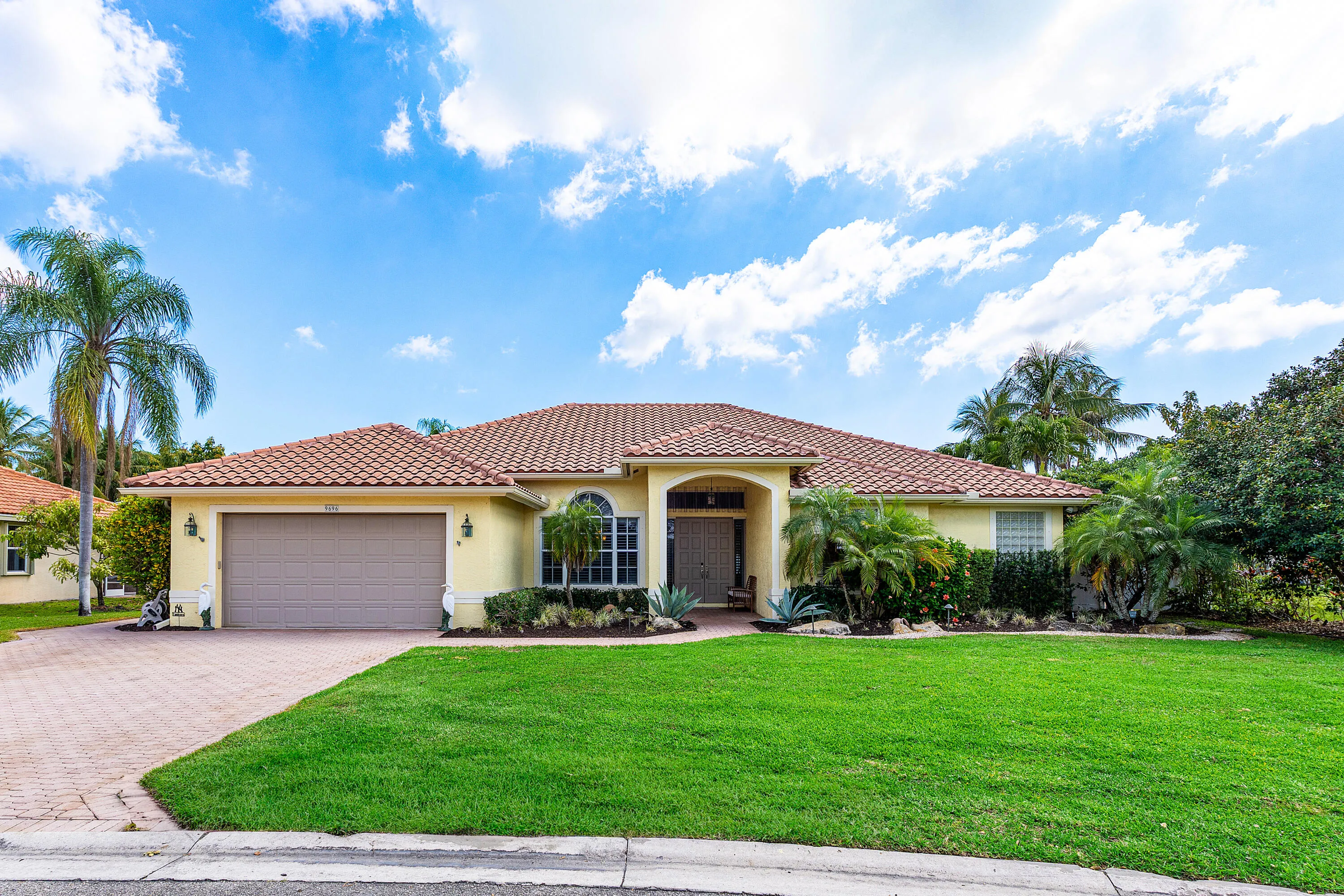 Bright and inviting foyer with soaring ceilings creating a spacious first impression in this Cypress Creek luxury home. Elegant entryway connecting the main living spaces of this well-maintained 4 bedroom, 3 bathroom residence.
