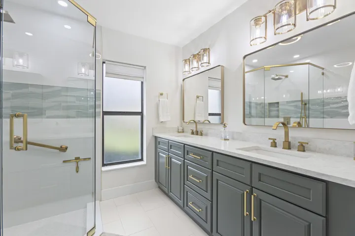 Fully renovated primary bath. Beautiful glass enclosure