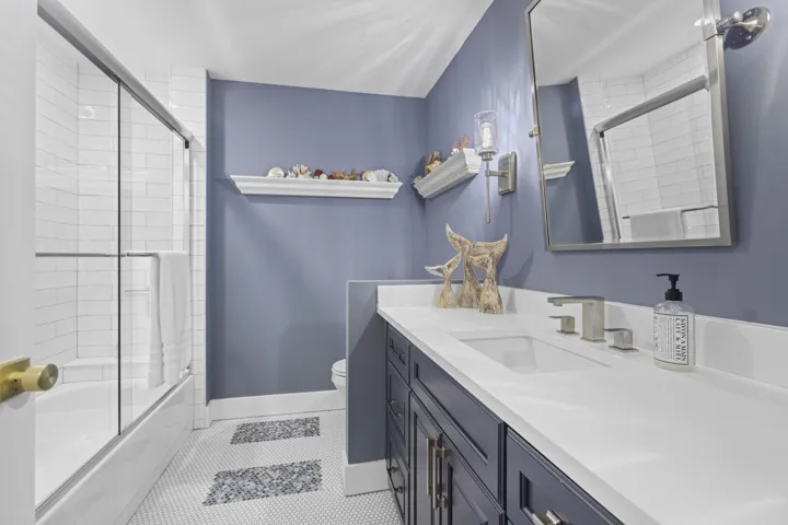 Hall bath remodeled with a coastal vibe