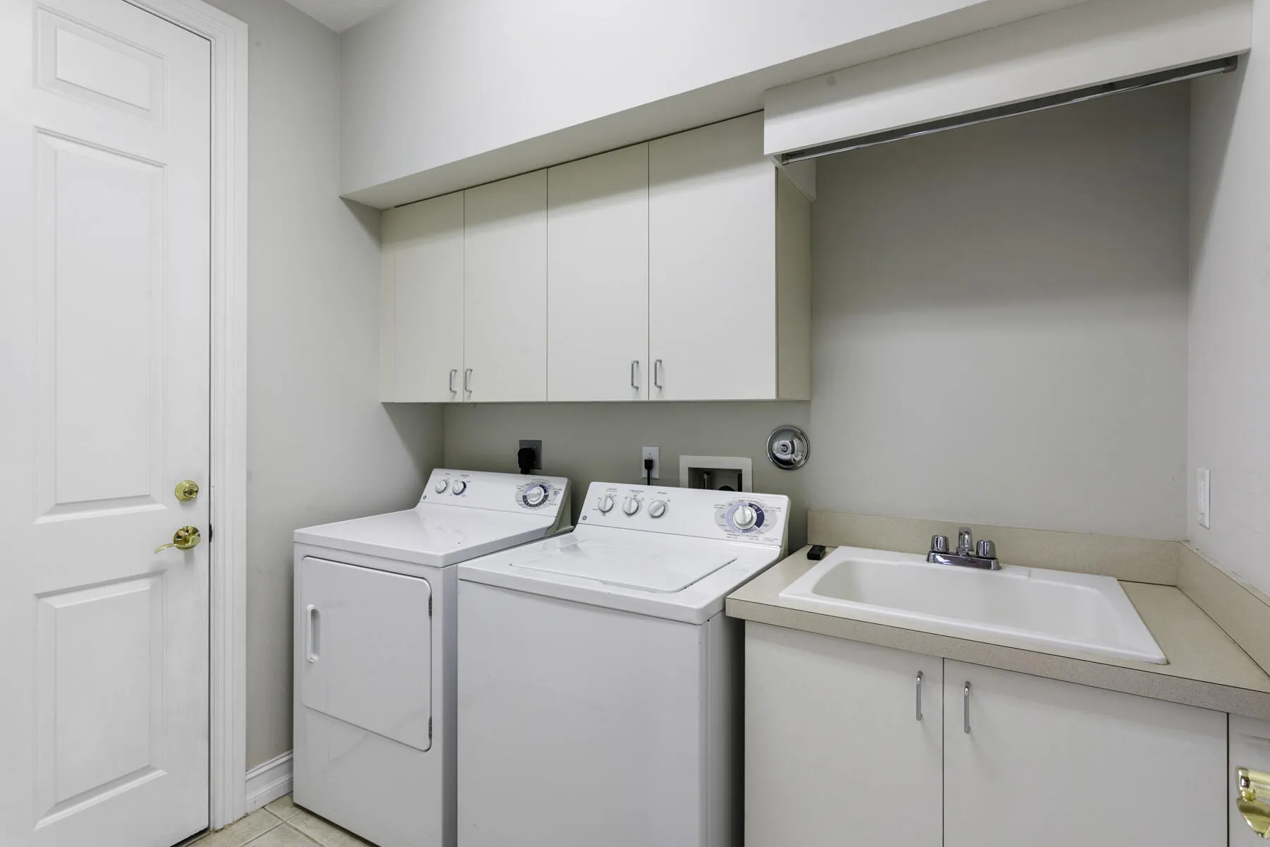 Two closets in this laundry room