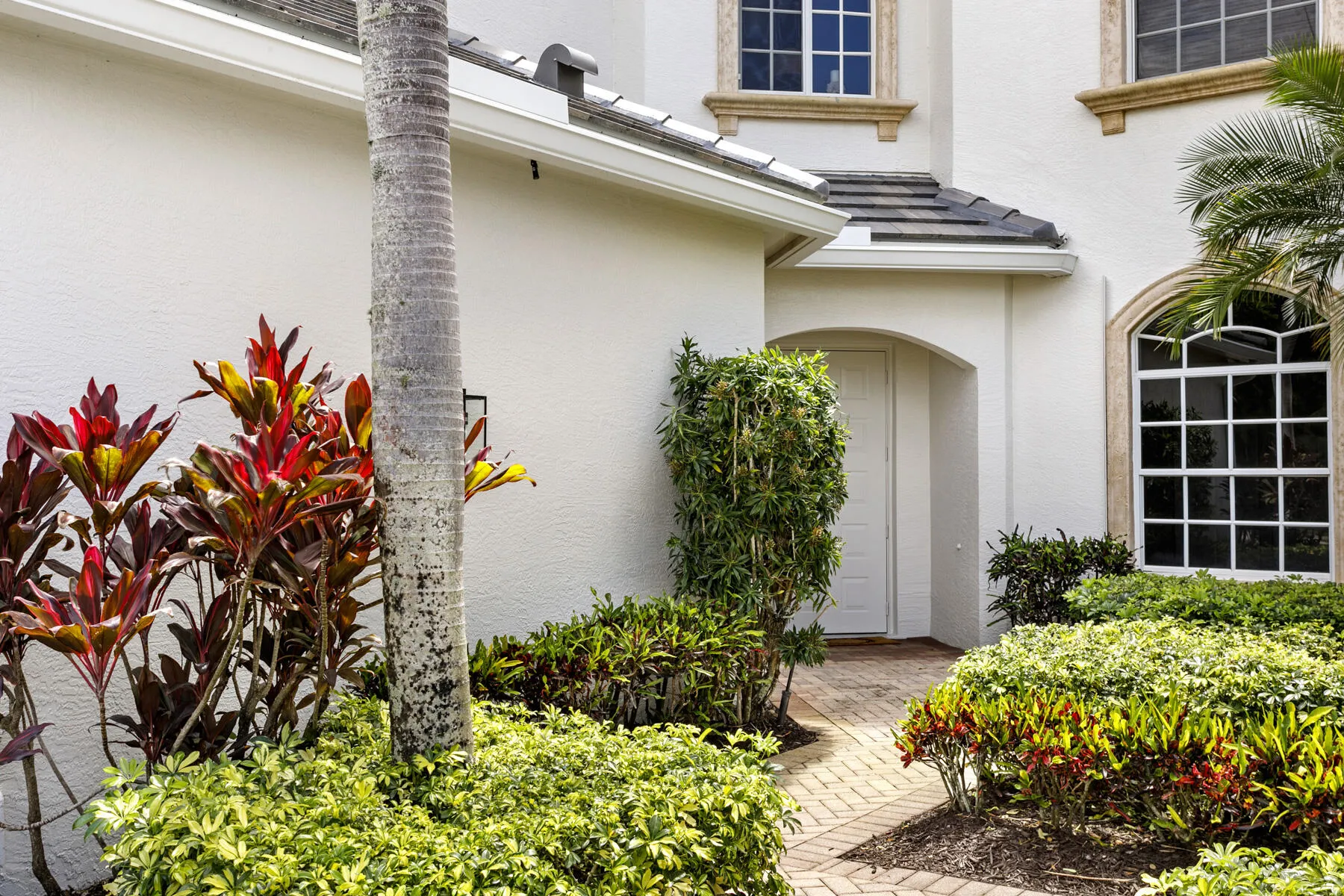 Brick pavers accent the front