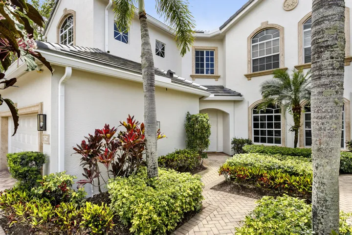 Stroll thru garden area to reach the front door