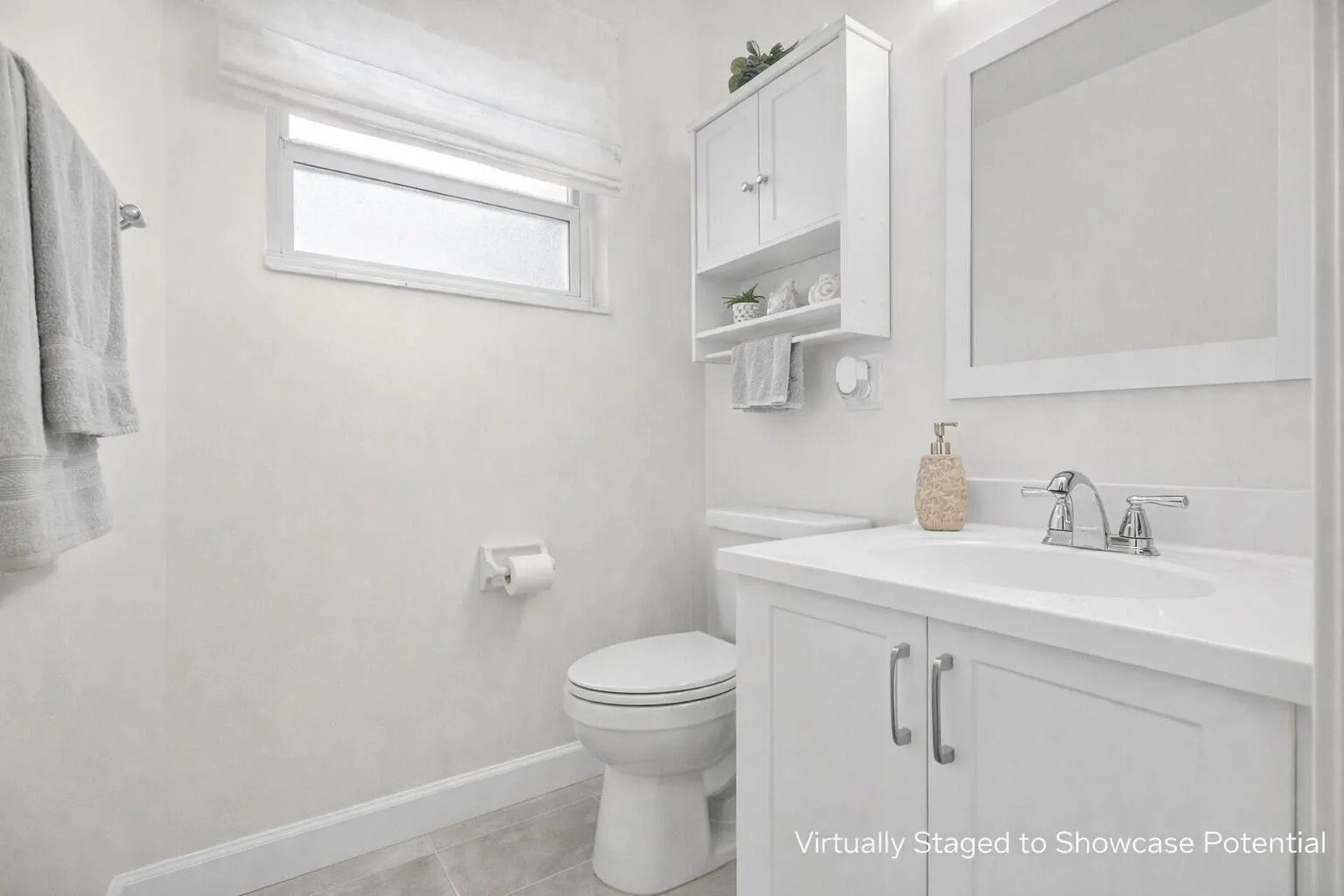 Convenient guest bathroom with modern vanity & natural light.