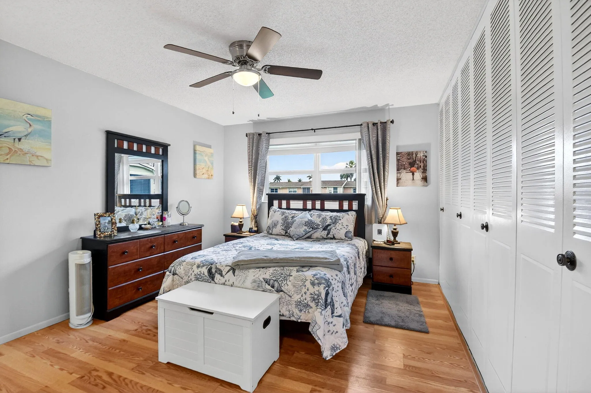 Bright room features ample storage & relaxing atmosphere