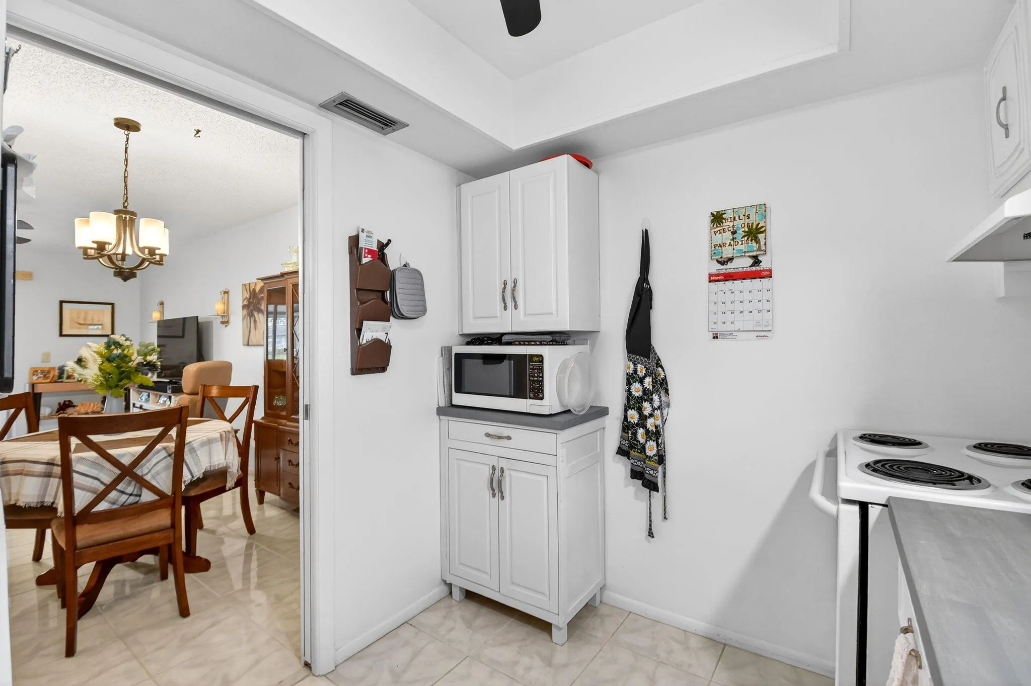 Additional cabinetry enhances organization & functionality.