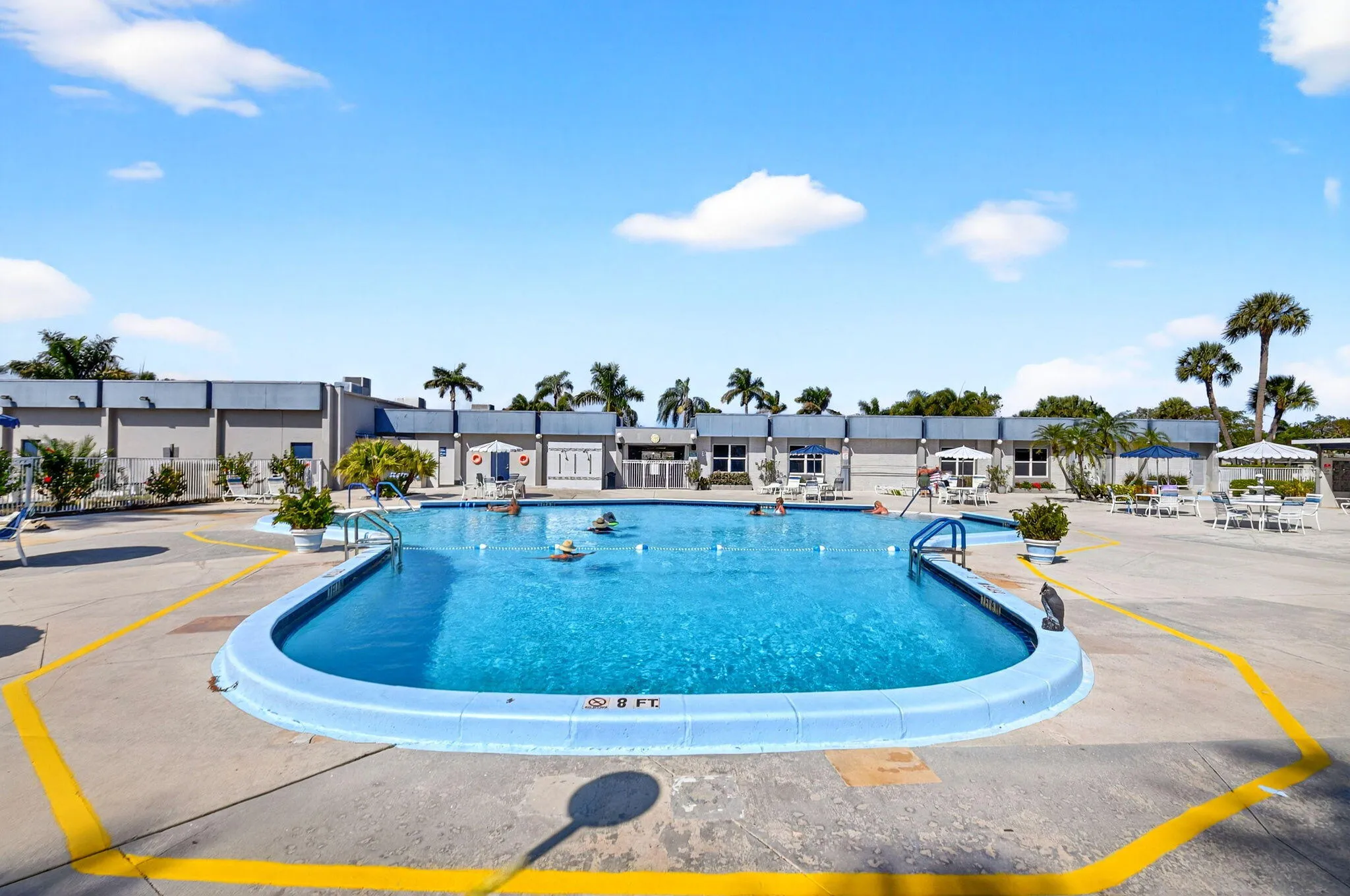 Sparkling pool with ample sun deck.