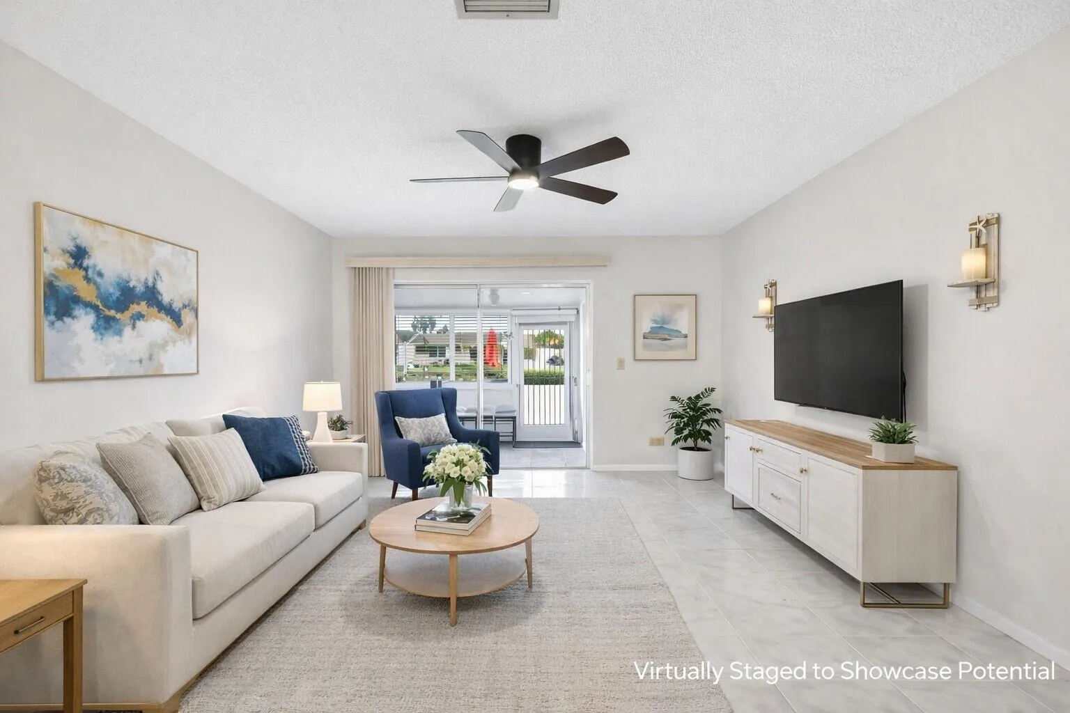 Comfortable living space flowing seemlessly to patio & outdoor views.