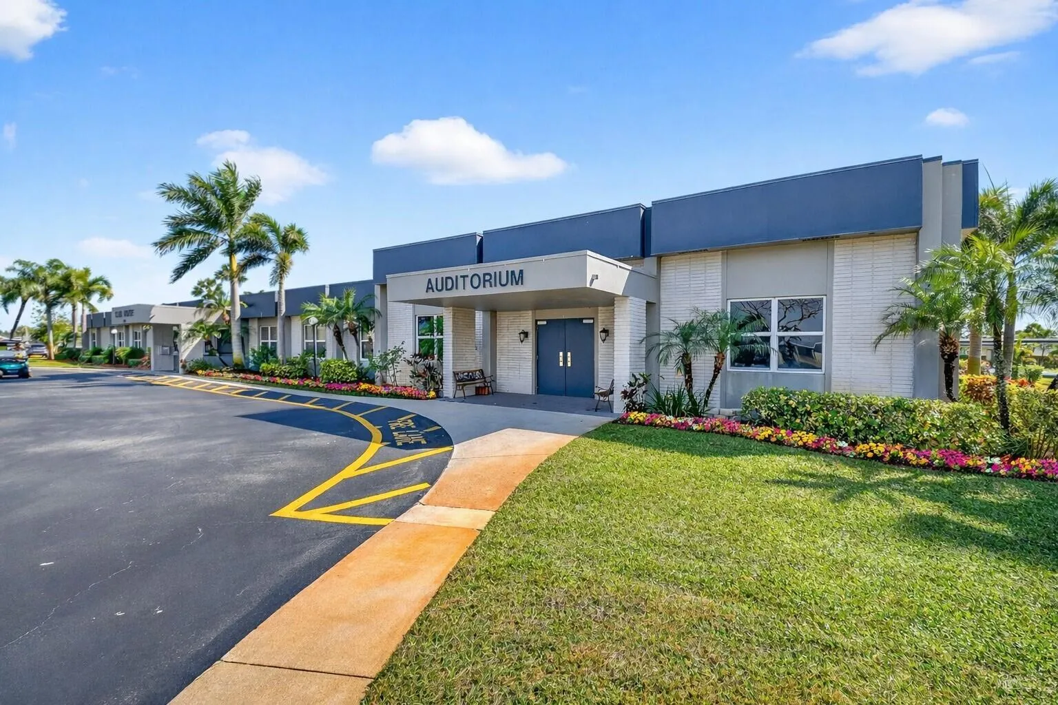 Fresh landscaping highlights clean, welcoming exterior facade.