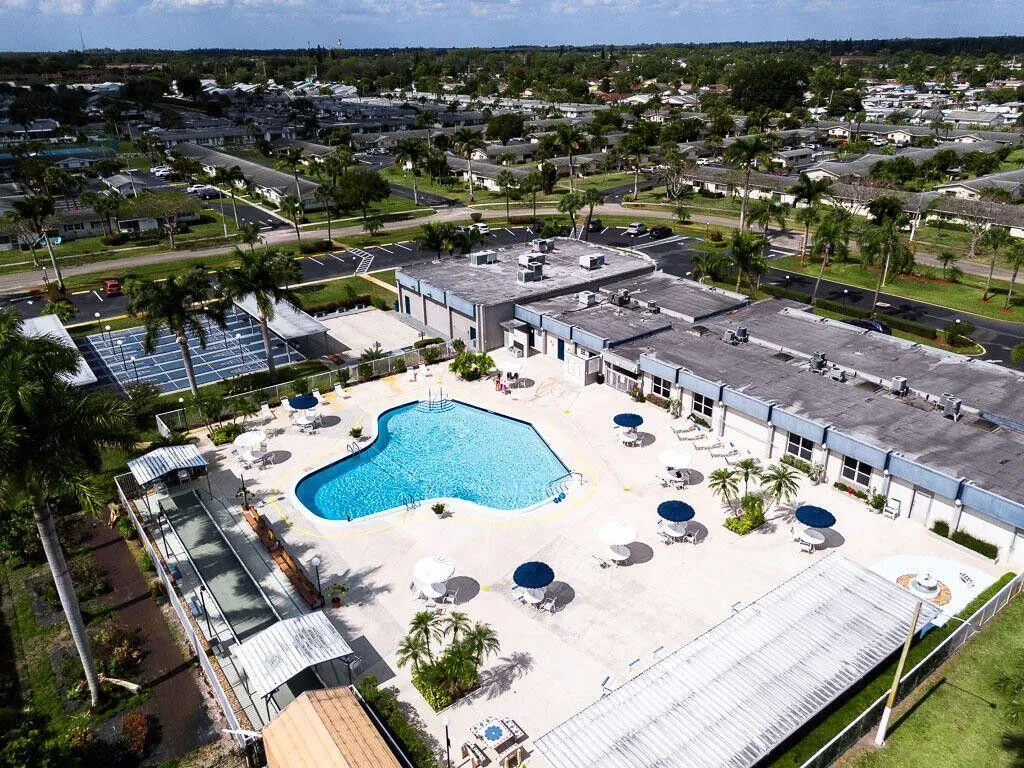 Spacious pool deck with ample seating areas.