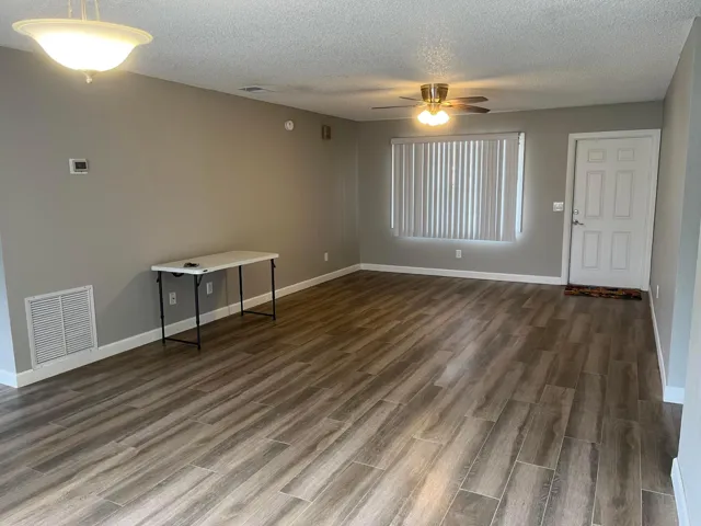 Wood-look tile flooring in the main living areas and bedrooms