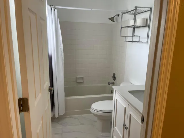 Updated primary bath has a tub