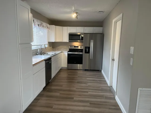 Updated kitchen with newer stainless appliances