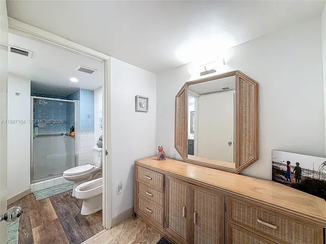 Vanity located outside of the bathroom