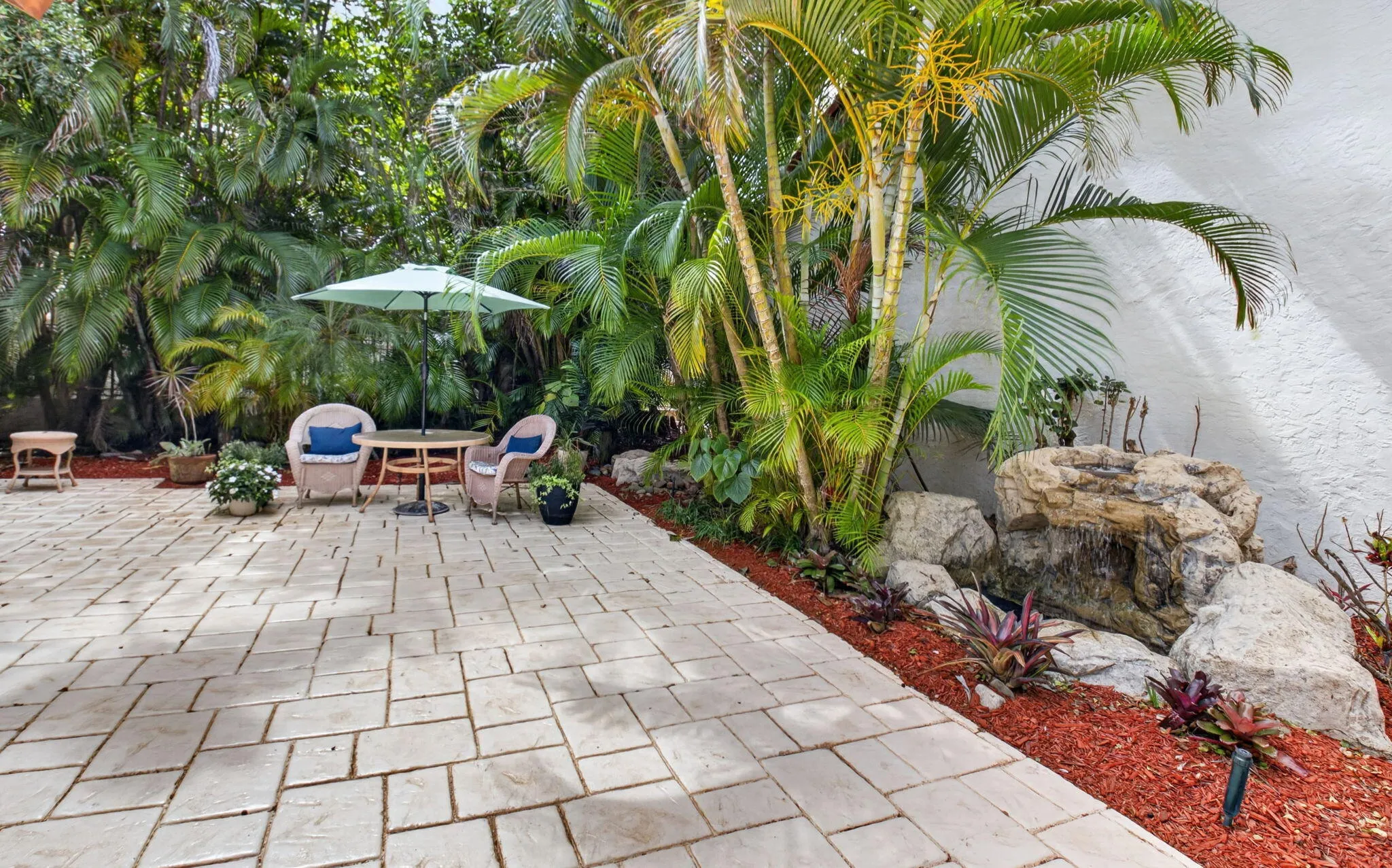TRANQUIL PRIVATE PATIO WITH WATERFALL
