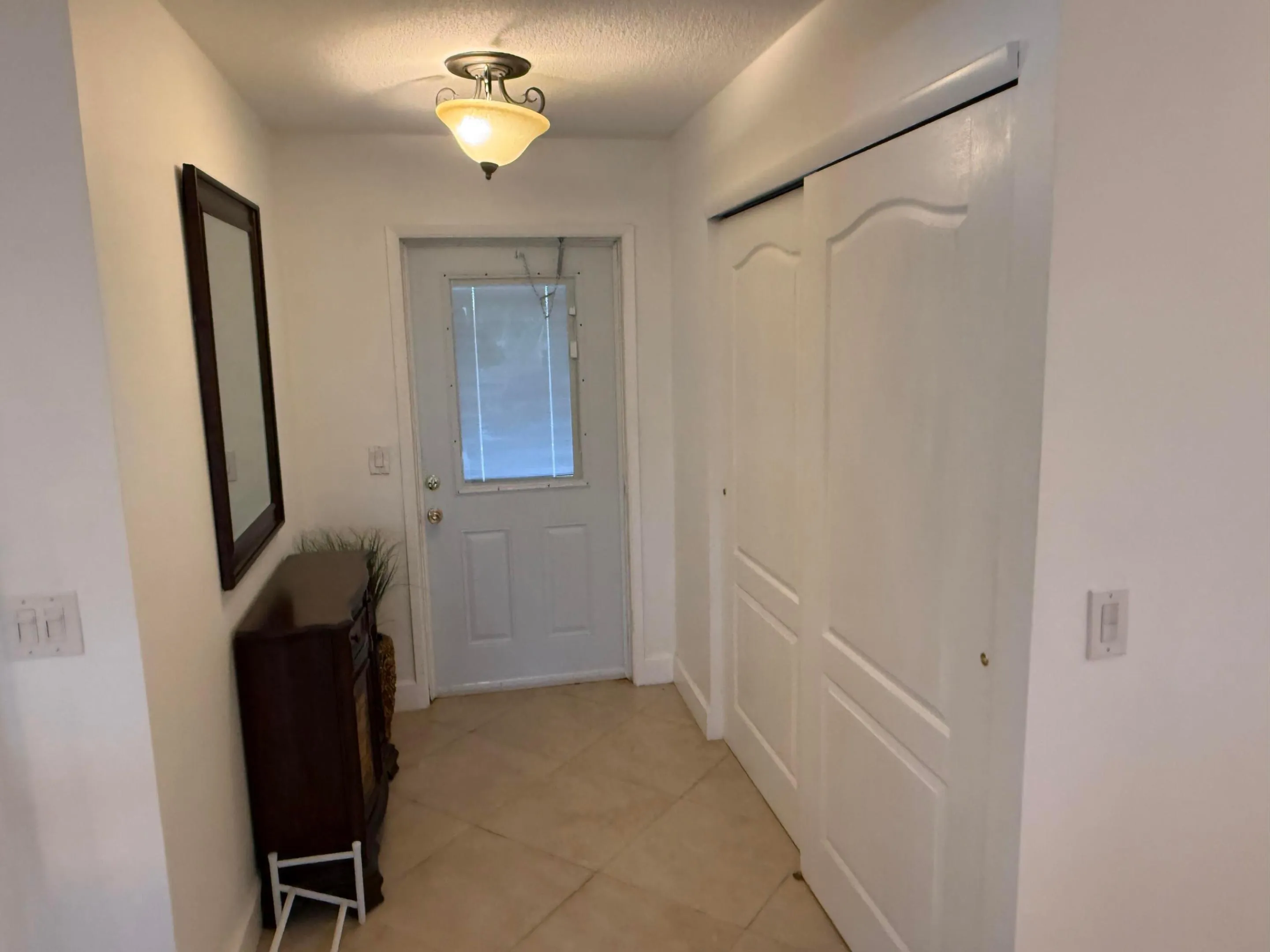 Washer/Dryer on Right in Closet facing Kitchen.