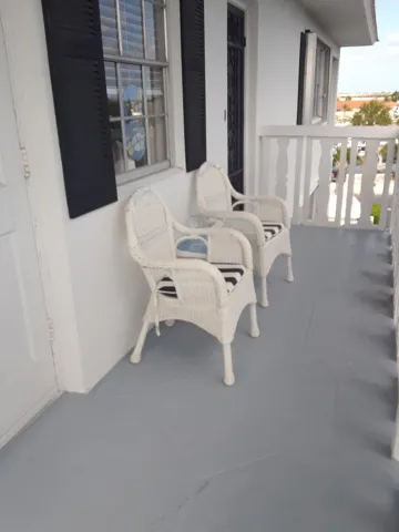 Open balcony provides outdoor living. Enjoy the views with your morning coffee.