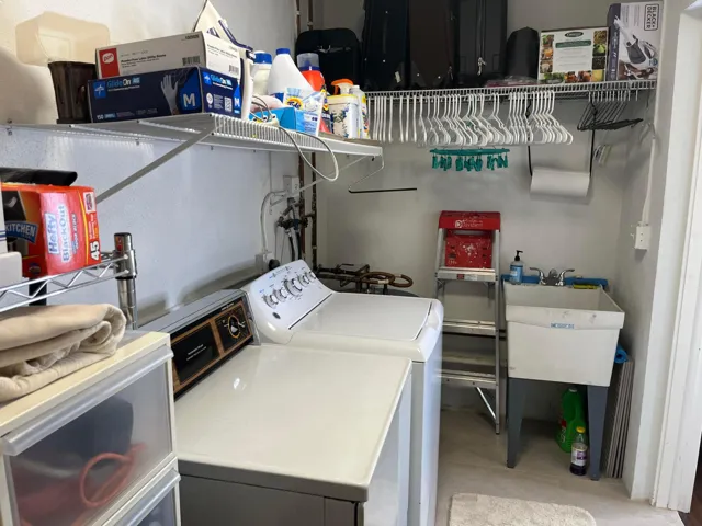 Washer and dryer are included, and there's a handy utility sink