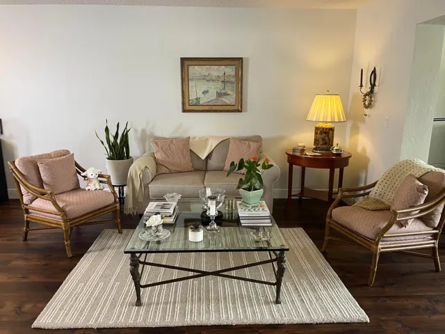 Formal living area is light and airy