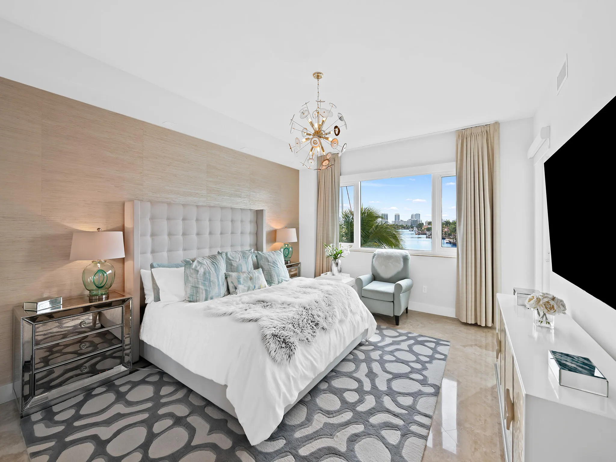 Primary Suite with direct access to the balcony.