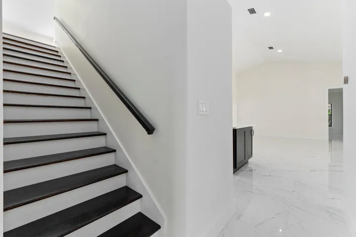 Stairs to 5th bedroom space