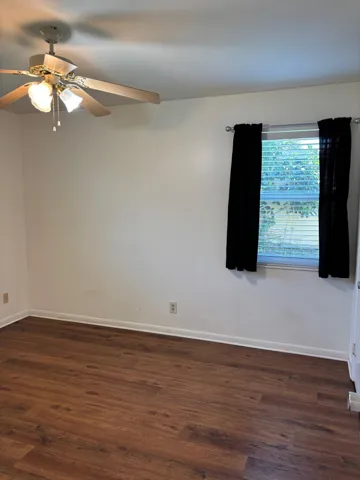 Nice bright bedroom Two windows Walk in Closet Beautiful floors through out