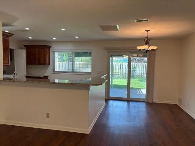 Gorgeous Kitchen Cabinets and Beautiful flooring throughout