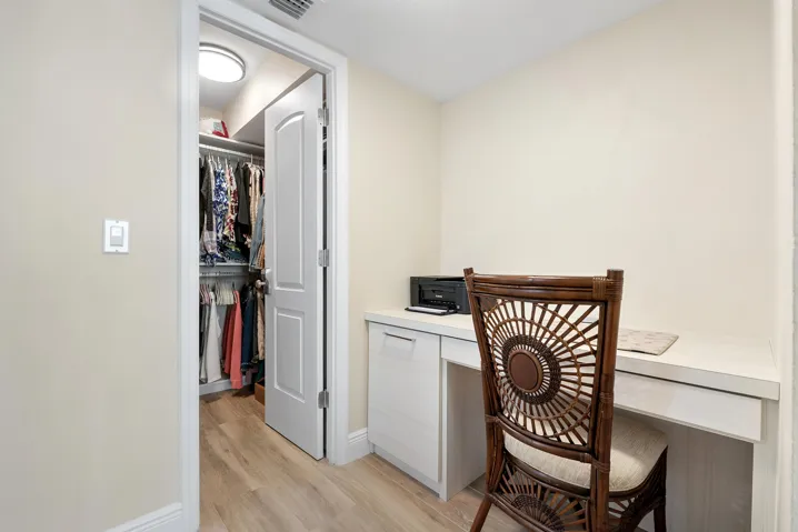 Desk in primary bedroon nook off walk-in closet and bath (could be a vanity, too)