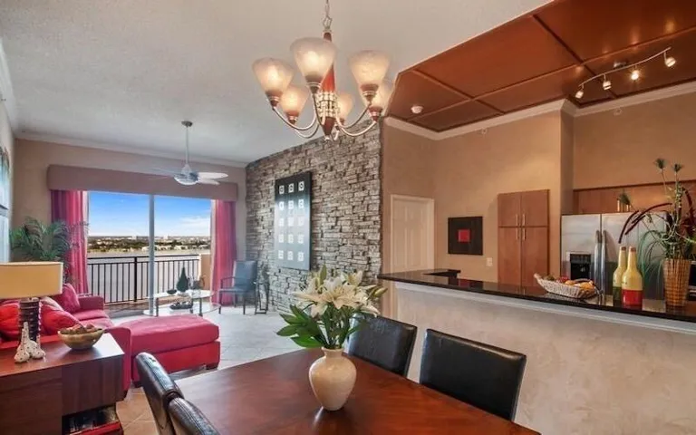 Fully furnished. Open LR, DR, Kitchen. Lake view.