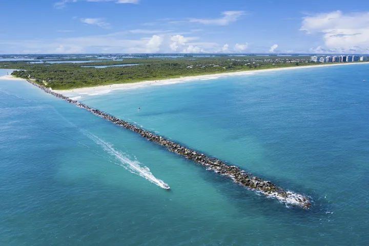 Boat Leaving Inlet
