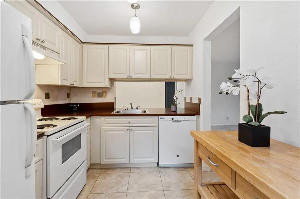 Kitchen with pass thru to dining area