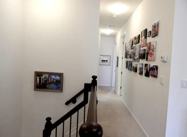 2nd Floor Hallway from Primary Suite to Guest Rooms, Guest Bath & Laundry Room