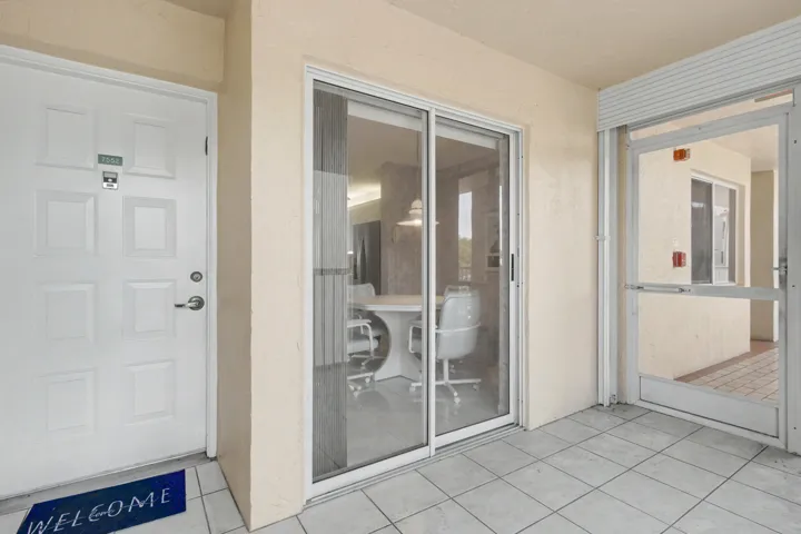 front entrance with screened patio