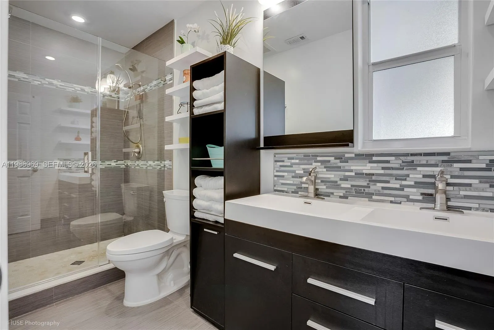 Gorgeous bathroom with a shower and 2 sinks