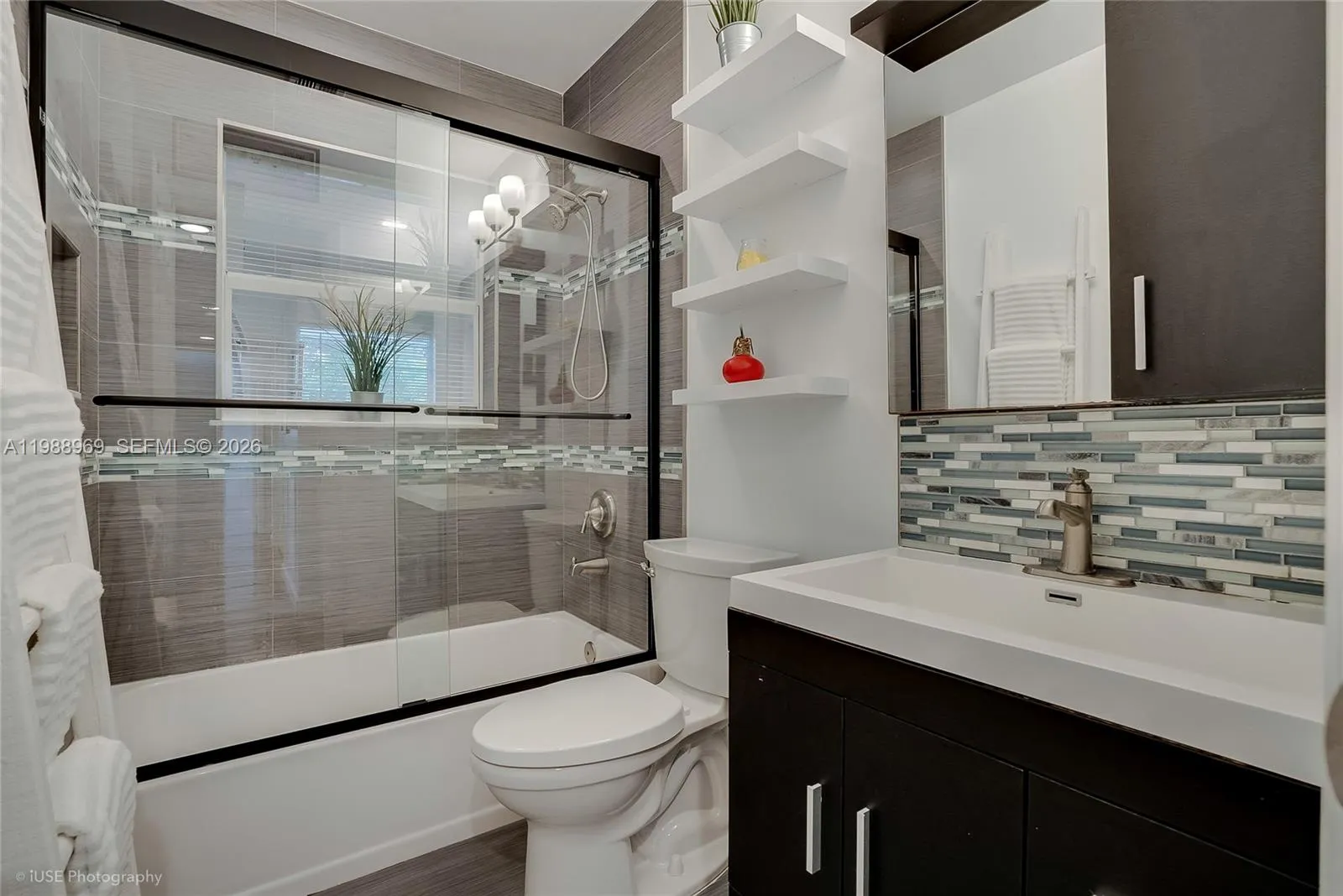 Guest bathroom has a tub