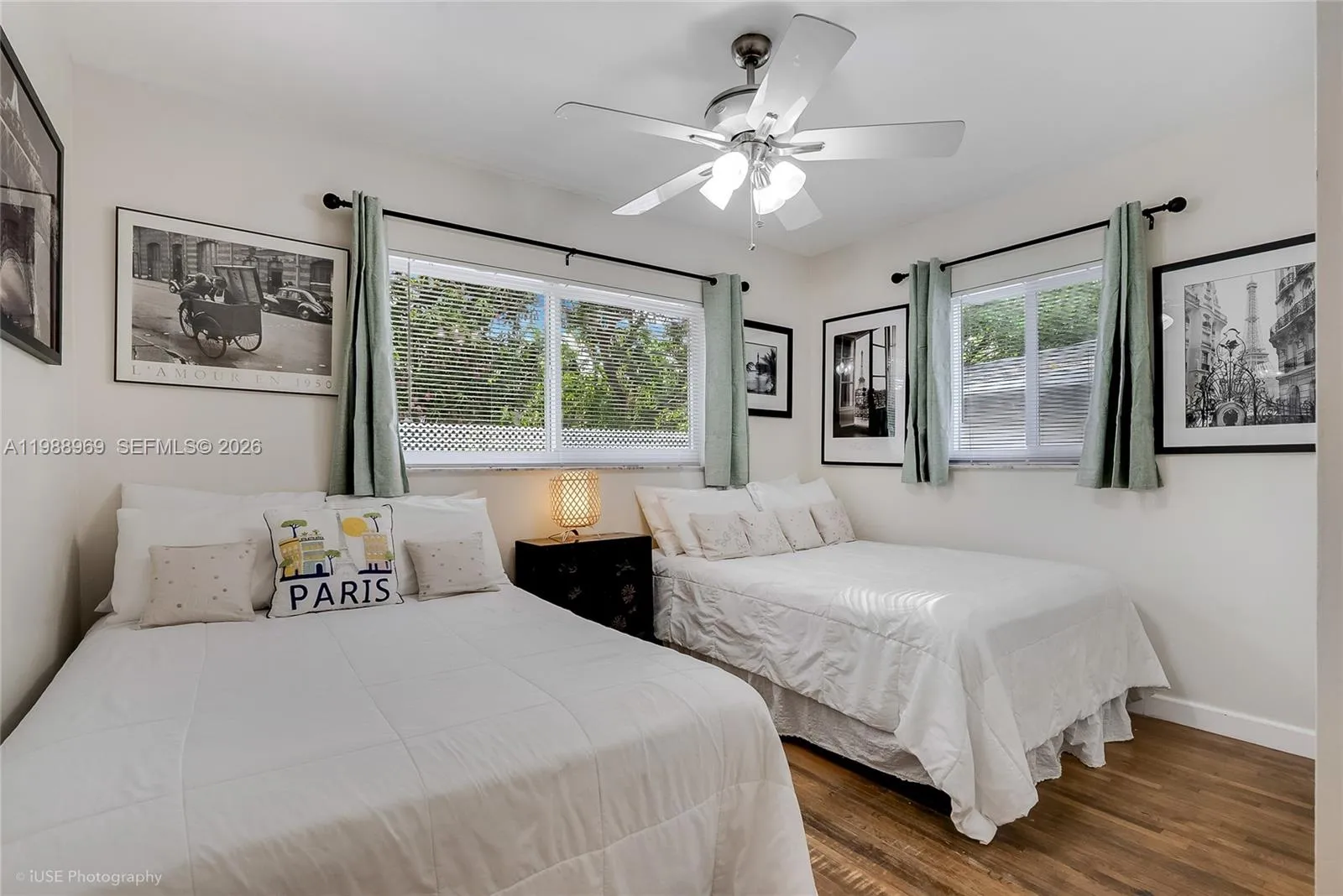 This corner bedroom very bright has 2 double size beds