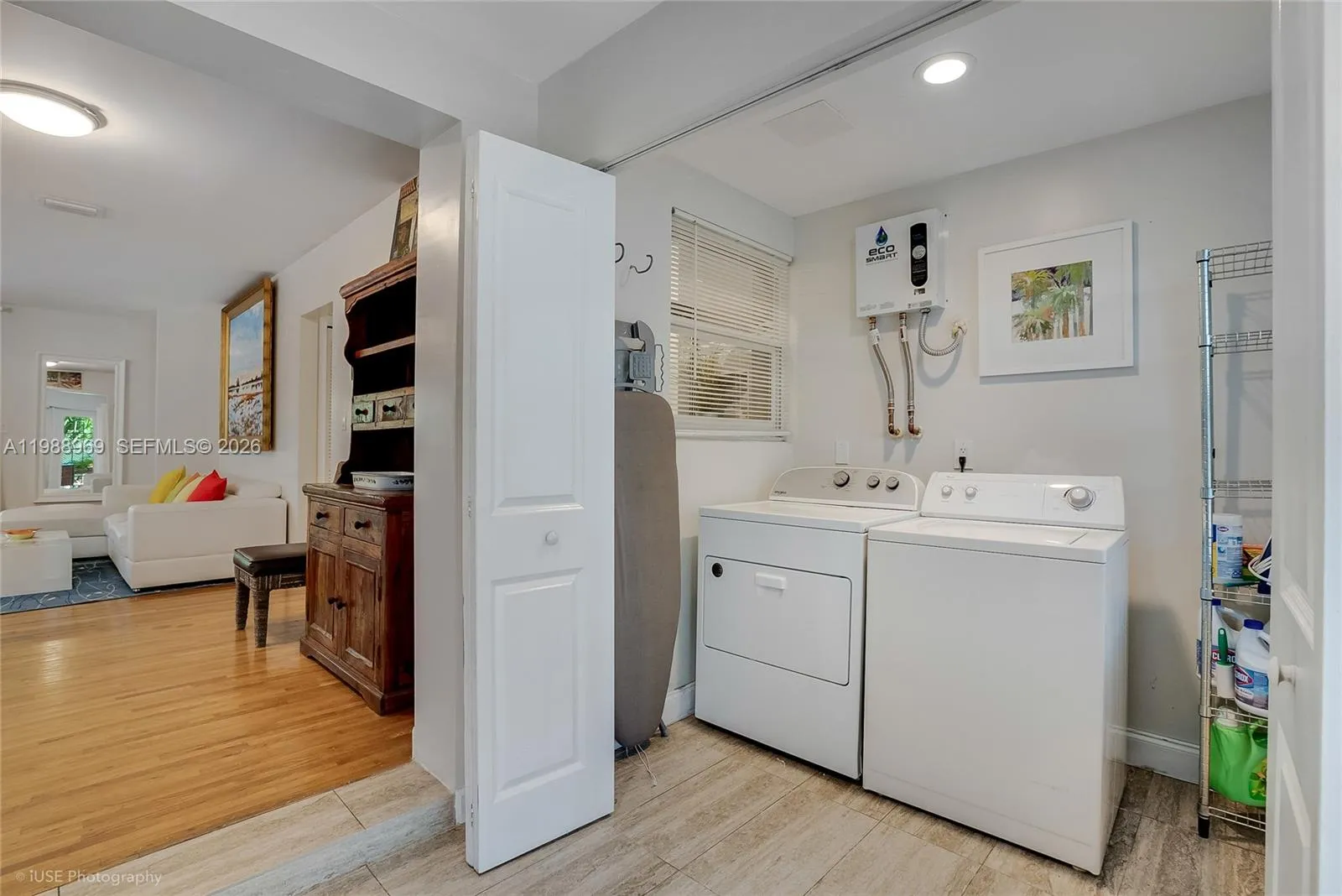 The double door closet has the laundry room