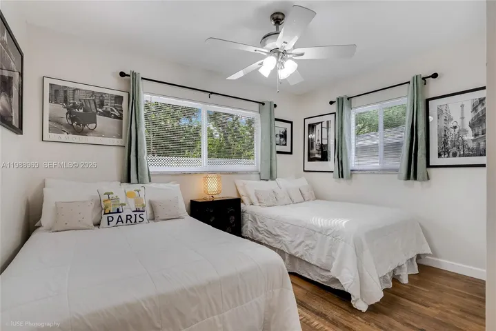This corner bedroom very bright has 2 double size beds