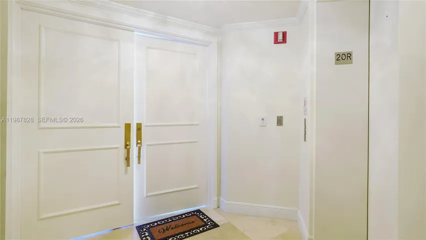 double doors from elevator into unit